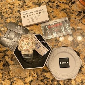 NWT Woman’s G-Shock. Clear band and rose gold face.Never worn or even tried on.